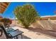 Backyard patio with comfortable seating and lush landscaping, offering privacy at 7928 E Pueblo Ave # 56, Mesa, AZ 85208