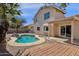 Backyard oasis with a swimming pool, patio area, and privacy landscaping at 811 N Los Feliz Dr, Chandler, AZ 85226