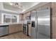 This light and bright kitchen has stainless steel appliances and lots of cabinet space at 811 N Los Feliz Dr, Chandler, AZ 85226