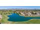 Breathtaking view of community featuring a serene lake and lush green golf course at 8138 E Via De La Escuela --, Scottsdale, AZ 85258