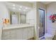 Bathroom features a large vanity, tiled floors, and a toilet at 8138 E Via De La Escuela --, Scottsdale, AZ 85258