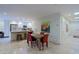 Bright open kitchen features stainless steel appliances, white cabinets, and breakfast bar at 8138 E Via De La Escuela --, Scottsdale, AZ 85258