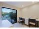 Well-lit office space with dual desks and access to the outdoor patio through sliding glass doors at 8138 E Via De La Escuela --, Scottsdale, AZ 85258