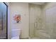 Shower room features a glass door, tile walls, and a shower head at 8138 E Via De La Escuela --, Scottsdale, AZ 85258