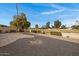 Low maintenance backyard, partially xeriscaped and covered in gravel at 829 S Revolta Cir, Mesa, AZ 85208