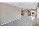 Large bonus room with tile floors, ceiling fans and a view to the kitchen at 829 S Revolta Cir, Mesa, AZ 85208