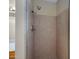 Walk-in shower with neutral tile, glass door, and silver fixtures at 829 S Revolta Cir, Mesa, AZ 85208