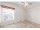 Inviting bedroom with vaulted ceiling, ceiling fan and large bright window at 8865 E Baseline Rd # 1731, Mesa, AZ 85209