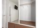 Spacious closet with sliding mirror doors, built-in storage and hanging racks at 8865 E Baseline Rd # 1731, Mesa, AZ 85209