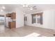 Open living area featuring hardwood floors, natural light and a kitchen view at 8865 E Baseline Rd # 1731, Mesa, AZ 85209