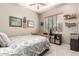 Cozy bedroom featuring natural light from the window and charming decorations at 9260 E Greenway St, Mesa, AZ 85207