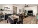 Open-concept living room with adjacent bar and dining areas, perfect for entertaining guests at 9260 E Greenway St, Mesa, AZ 85207