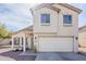 Charming two-story home with neutral stucco and tile roof at 9405 W Palmer Dr, Peoria, AZ 85345