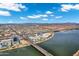 Captivating aerial shot of a lakeside community, highlighting its connectivity with bridge access and scenic water views at 945 E Playa Del Norte Dr # 5005, Tempe, AZ 85288