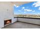 Outdoor balcony featuring a cozy fireplace and gorgeous city views at 945 E Playa Del Norte Dr # 5005, Tempe, AZ 85288