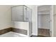 Updated bathroom featuring glass shower and an open walk-in closet at 945 E Playa Del Norte Dr # 5005, Tempe, AZ 85288