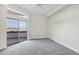 Bedroom with carpet and balcony access; great views and ample space for customization at 945 E Playa Del Norte Dr # 5005, Tempe, AZ 85288