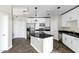 Bright kitchen featuring stainless appliances, granite countertops, and designer pendant lighting at 945 E Playa Del Norte Dr # 5005, Tempe, AZ 85288