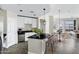 Bright kitchen with stainless appliances, granite countertops, island and dining area at 945 E Playa Del Norte Dr # 5005, Tempe, AZ 85288