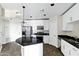 Bright kitchen featuring stainless appliances, granite countertops, and designer pendant lighting at 945 E Playa Del Norte Dr # 5005, Tempe, AZ 85288