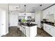Bright kitchen with stainless appliances, granite countertops, island with barstool seating at 945 E Playa Del Norte Dr # 5005, Tempe, AZ 85288