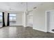A bright living room featuring tile floors, a ceiling fan, and large windows offering scenic views at 945 E Playa Del Norte Dr # 5005, Tempe, AZ 85288