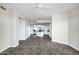 Spacious living room featuring tile floors that seamlessly flow into the modern kitchen with stainless appliances at 945 E Playa Del Norte Dr # 5005, Tempe, AZ 85288