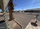 Spacious backyard offering privacy and potential for customization; desert rock at 10013 W Alabama Ave, Sun City, AZ 85351