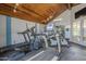 Community gym with vaulted ceilings, workout equipment, and various machines and weights at 10115 E Mountain View Rd # 2042, Scottsdale, AZ 85258