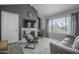 Inviting living room featuring a fireplace, modern decor, and an abundance of natural light at 10115 E Mountain View Rd # 2042, Scottsdale, AZ 85258