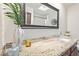 Bathroom featuring granite countertops, undermount sink and a large framed mirror at 10127 E Minnesota Ave, Sun Lakes, AZ 85248