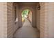 Covered entryway featuring decorative archway leading to front yard at 10127 E Minnesota Ave, Sun Lakes, AZ 85248