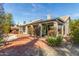 Backyard view of lush landscaping and an outdoor seating area, perfect for relaxation at 10337 E Michigan Ave, Sun Lakes, AZ 85248