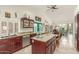 Spacious kitchen with granite counters, a kitchen island, and stainless steel appliances at 10337 E Michigan Ave, Sun Lakes, AZ 85248