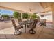 The back patio has a ceiling fan and lots of seating at 10511 W Edgewood Dr, Sun City, AZ 85351