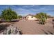 Explore this charming home's backyard, landscaped with desert plants and mature citrus trees at 10511 W Edgewood Dr, Sun City, AZ 85351