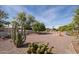 Lush desert landscaping graces this home, creating a serene and inviting outdoor space at 10511 W Edgewood Dr, Sun City, AZ 85351