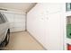 This garage has built in cabinets at 10511 W Edgewood Dr, Sun City, AZ 85351