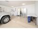 This garage has a washer, dryer, sink, refrigerator and cabinets at 10511 W Edgewood Dr, Sun City, AZ 85351