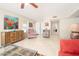 Inviting living room with neutral tile flooring and natural light at 10511 W Edgewood Dr, Sun City, AZ 85351