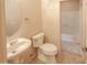 Bathroom showcases a pedestal sink, oval mirror, tile flooring and toilet at 11011 N Zephyr Dr # 106, Fountain Hills, AZ 85268