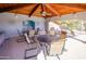 Poolside lounge area with a vaulted ceiling, ceiling fan, and comfortable seating arrangement at 11011 N Zephyr Dr # 106, Fountain Hills, AZ 85268