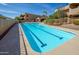 Bright blue swimming pool perfect for lap swimming at 11011 N Zephyr Dr # 106, Fountain Hills, AZ 85268