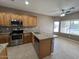 Kitchen featuring granite countertops and stainless steel appliances, lots of cabinet space at 11946 W Jackson St, Avondale, AZ 85323