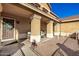 Inviting front porch with comfortable seating and decorative accents at 1202 E Milada Dr, Phoenix, AZ 85042