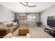 Cozy living room featuring neutral tones, comfortable seating, and natural light at 1202 E Milada Dr, Phoenix, AZ 85042