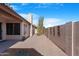 Private backyard featuring desert landscaping and a block wall for privacy at 12215 S Potomac St, Phoenix, AZ 85044