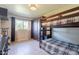 Functional bedroom featuring a bunk bed and built-in storage, perfect for or guests at 1335 E Oregon Ave, Phoenix, AZ 85014