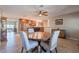 Bright dining area with a ceiling fan conveniently situated adjacent to the kitchen at 1335 E Oregon Ave, Phoenix, AZ 85014