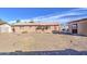 Expansive backyard with clear skies and a storage shed at 1340 N Oregon St, Chandler, AZ 85225